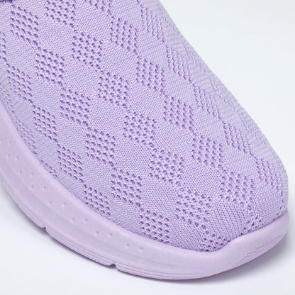 Close-up of a light purple clog on a white background