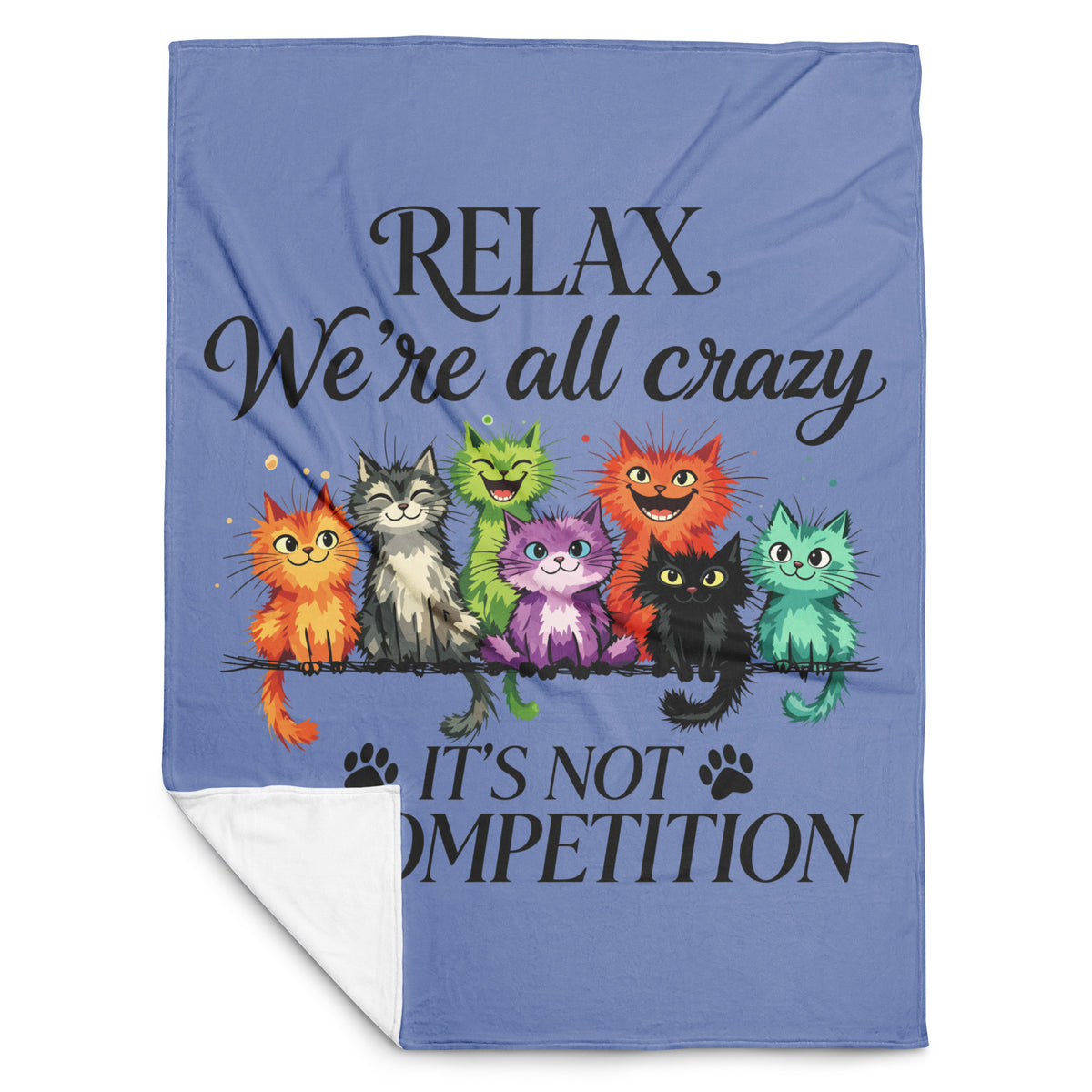 A blue throw blanket with a white sherpa lining, featuring a graphic of seven colorful cartoon cats and the text 'RELAX We're all crazy IT'S NOT COMPETITION'.