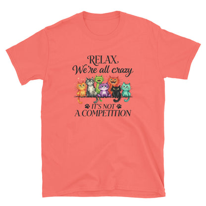 Coral t-shirt with cartoon cats and text on a white background