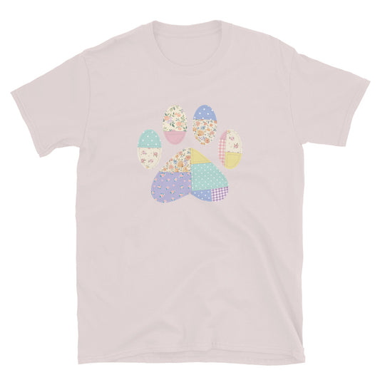 Light pink t-shirt with a colorful paw print design on a white background