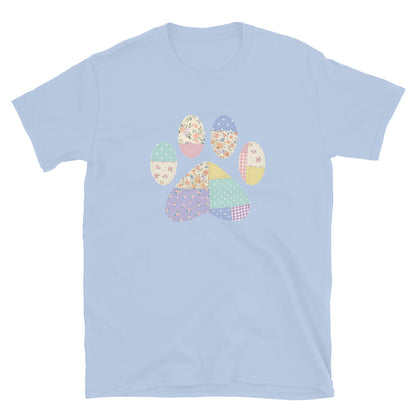 Light blue t-shirt with a colorful paw print design on a white background