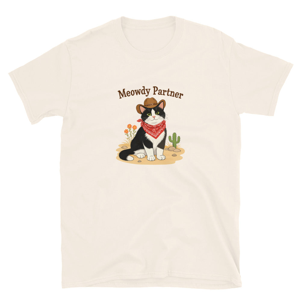 A light yellow shirt featuring a cat dressed up as a cowboy that says Meowdy Partner