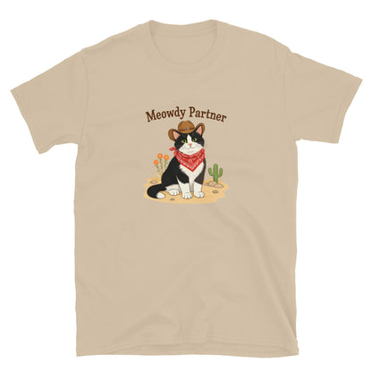 A tan shirt featuring a cat dressed up as a cowboy that says Meowdy Partner