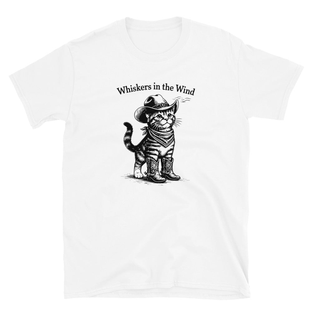 White t-shirt with a black and white graphic of a cat wearing a cowboy hat and boots, and text 'Whiskers in the Wind'.