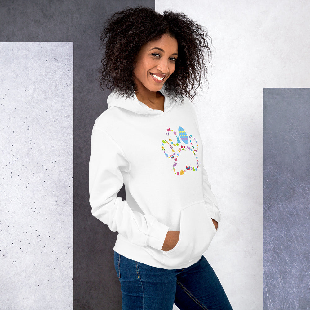 Woman wearing a white hoodie with colorful text and graphics against a gray and white background