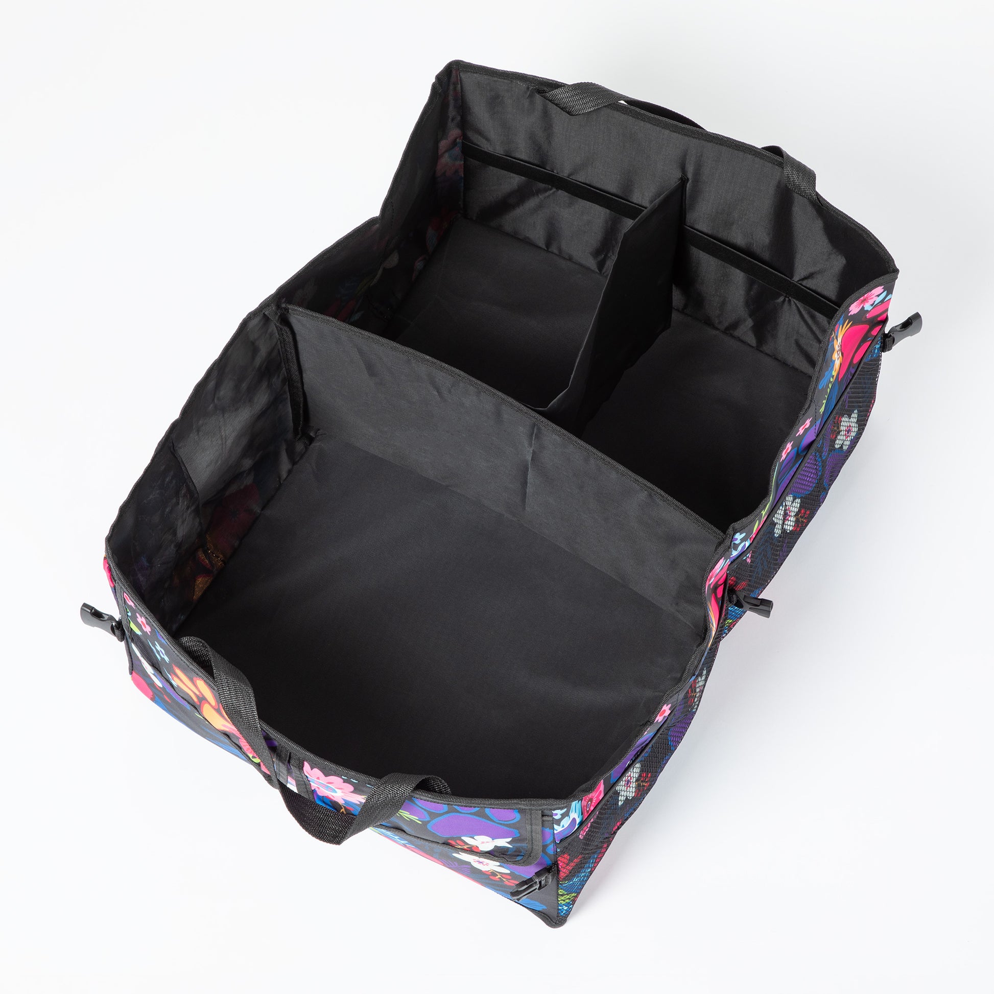 View from above showing the 3 large compartments of the paw printed car trunk organizer.