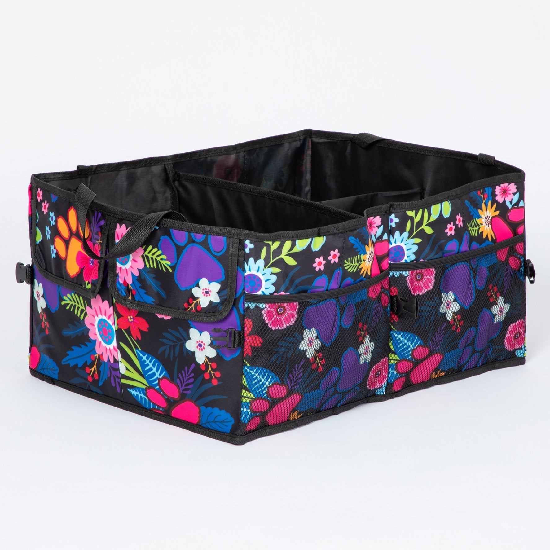 A bright floral and paw print patterned collapsible car trunk organizer on a white background.
