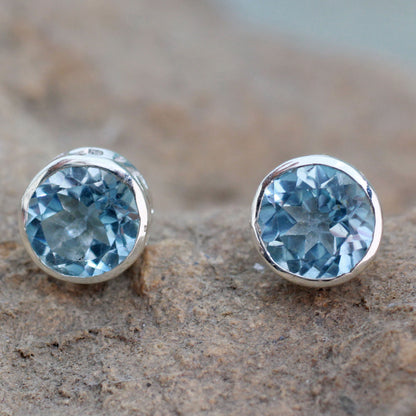 Spark of Life Blue Topaz Silver Wave Earrings