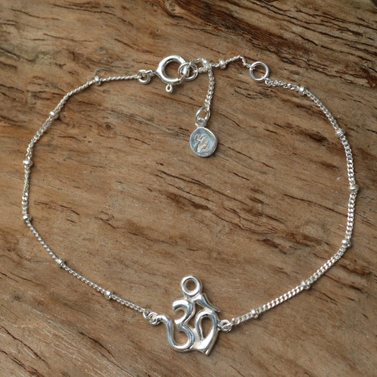 Centered Om Sterling Silver Cuban Link Chain Bracelet with Om Symbol