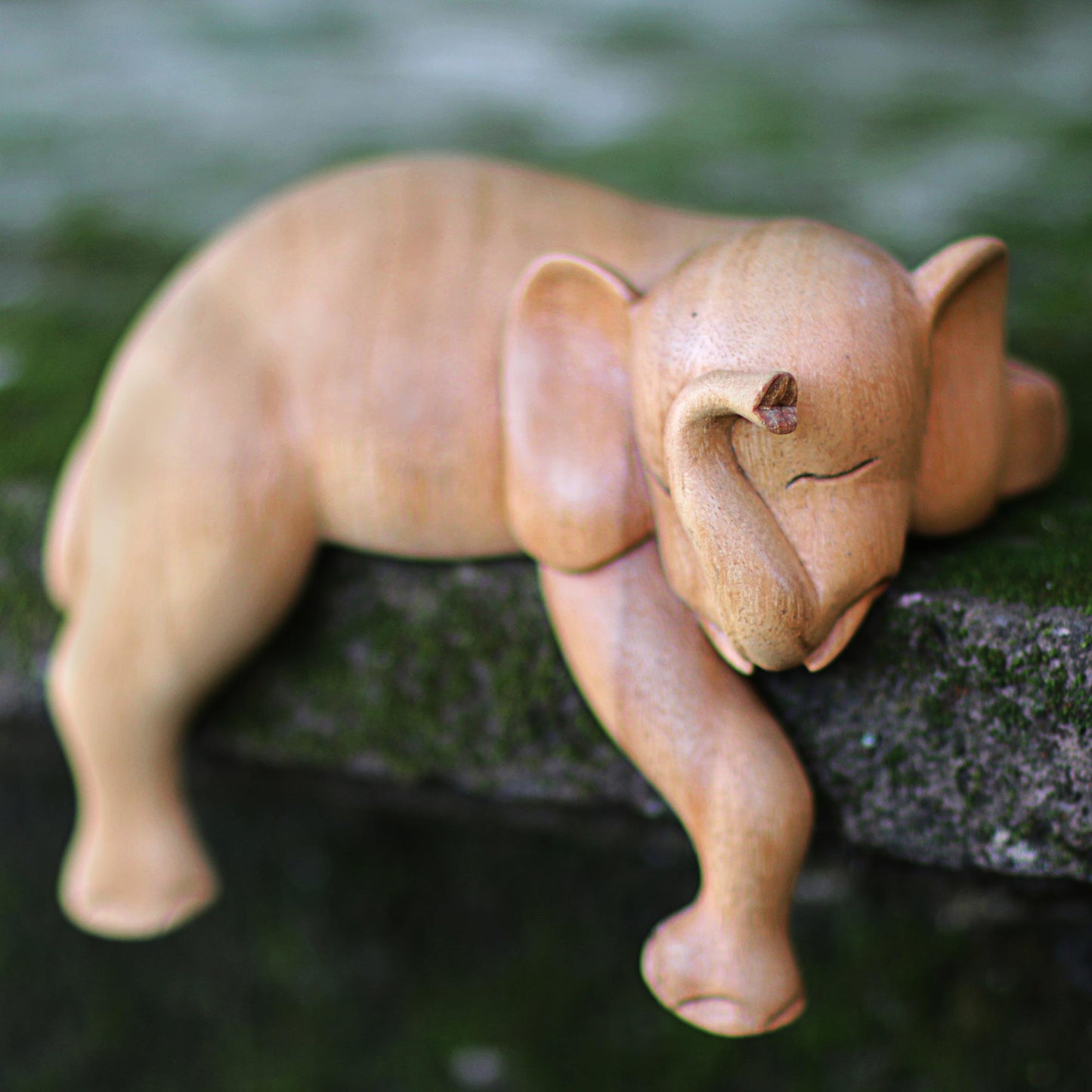 Napping Elephant Hand Carved Elephant Sculpture Natural Finish from Indonesia