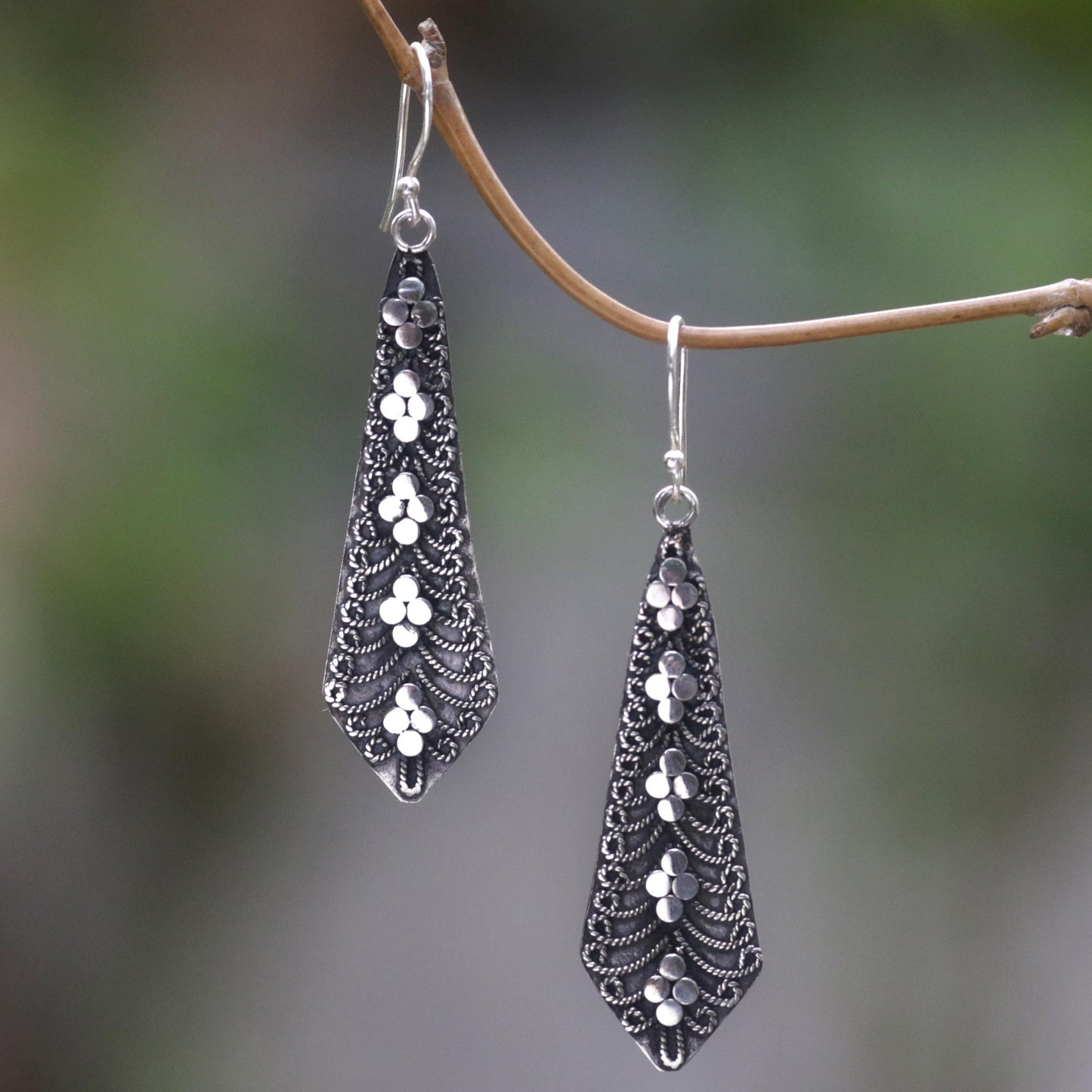 Flower Sword Dangling Silver Earrings Adorned With Balinese Motifs