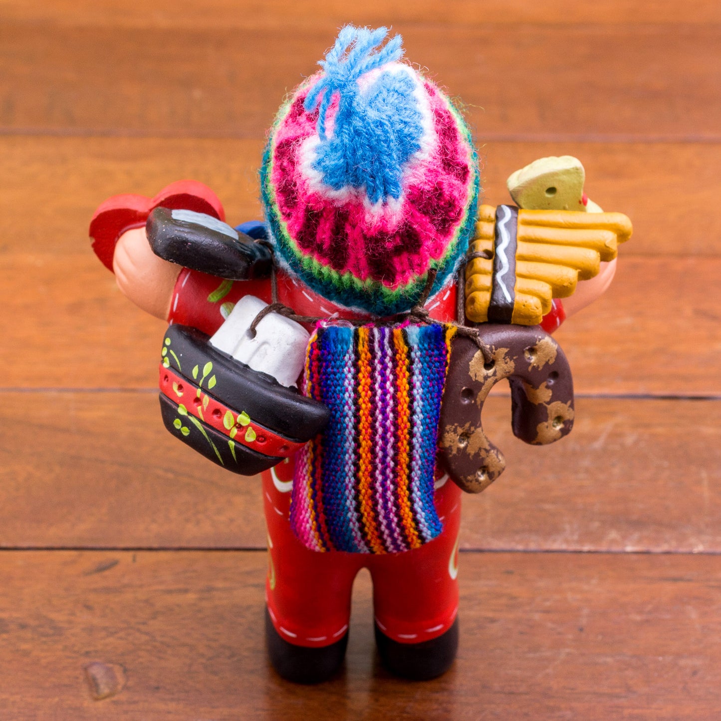 Ekeko of Abundance in Red Red Painted Ekeko Sculpture with Wool Cap from Peru