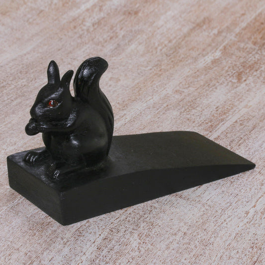 Helpful Squirrel in Black Handcrafted Wood Squirrel Doorstop in Black from Bali