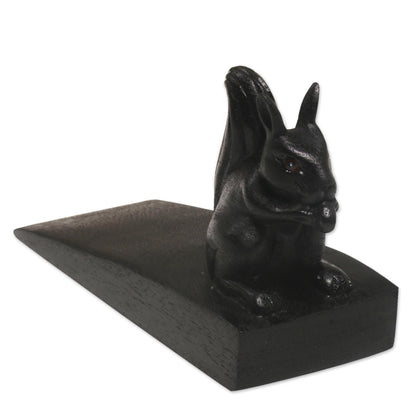 Helpful Squirrel in Black Handcrafted Wood Squirrel Doorstop in Black from Bali