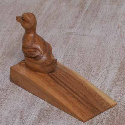 Helpful Duck in Brown Handcrafted Suar Wood Duck Doorstop in Brown from Bali