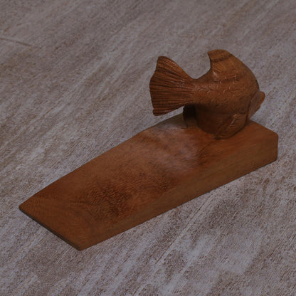 Helpful Goldfish in Brown Handcrafted Suar Wood Fish Doorstop in Brown from Bali