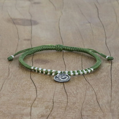 Ancient Om in Green Silver Om Charm Bracelet on Braided Green Cords