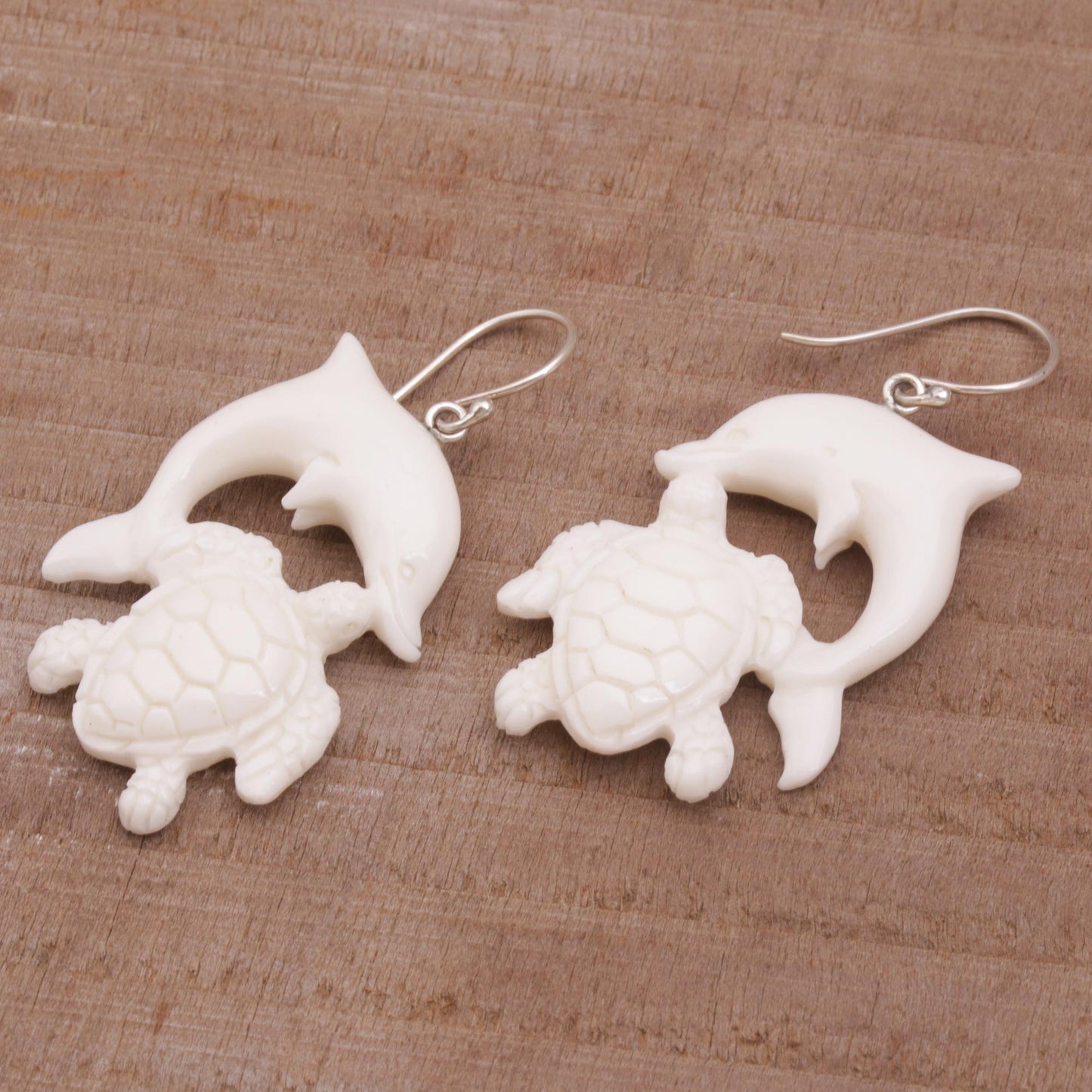 Friends Among the Waves Bone Dangle Earrings with Dolphin and Tortoise Theme