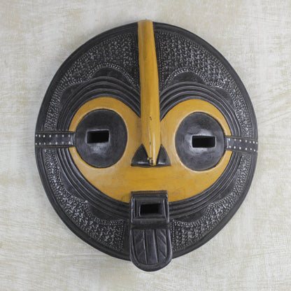 Continuation Yellow and Black African Hand Carved Wood Mask