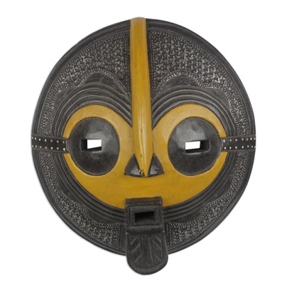 Continuation Yellow and Black African Hand Carved Wood Mask