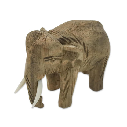 Peaceful Elephant Brown Wood Sculpture