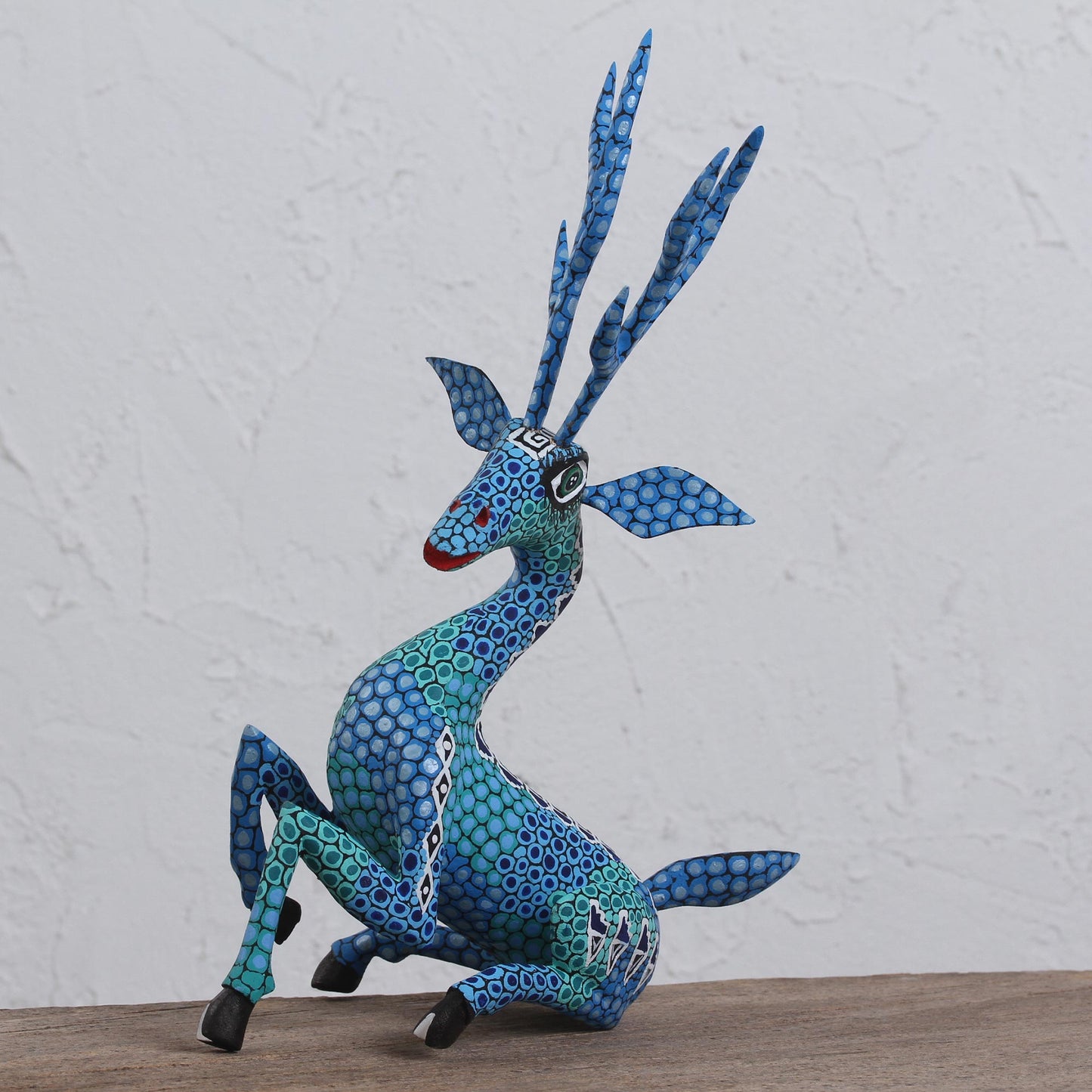 Resting Deer Hand-Painted Wood Alebrije Deer Sculpture in Blue