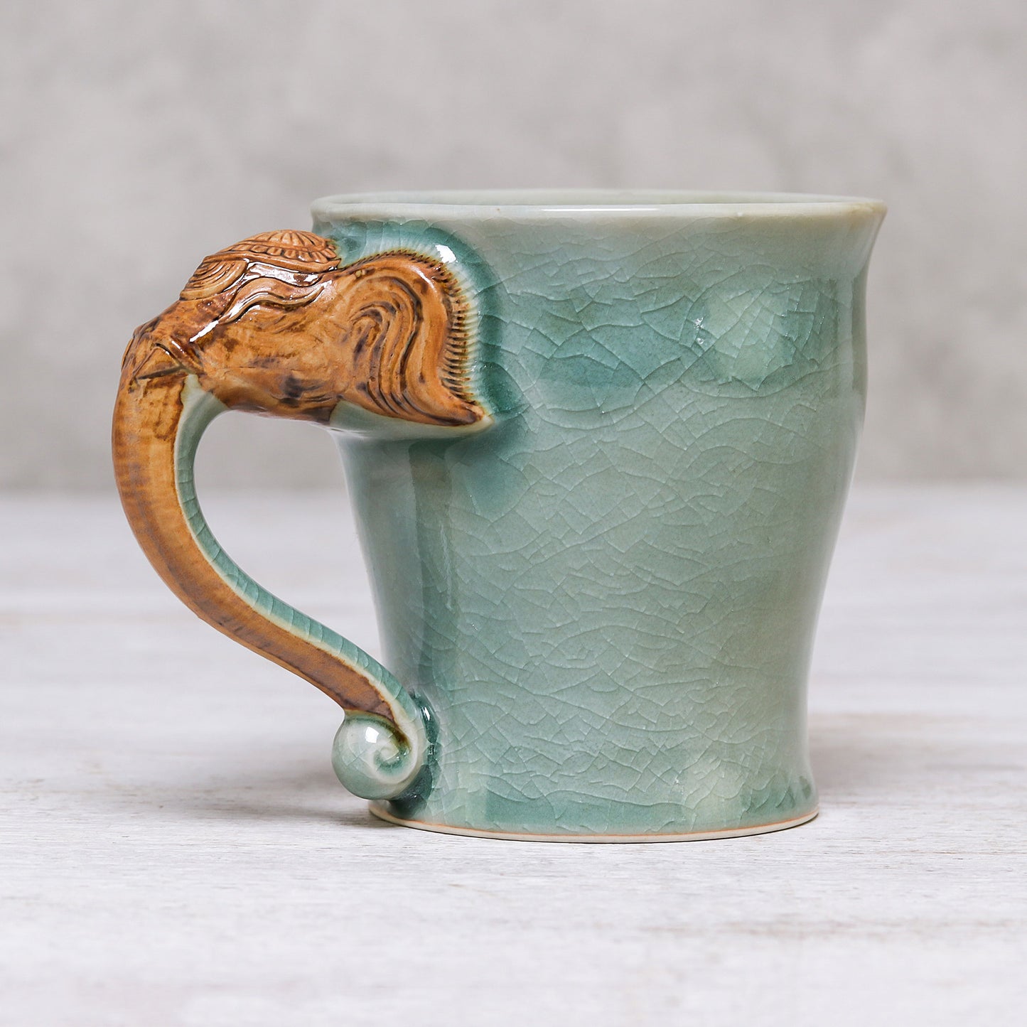 Elephant Handle in Green Celadon Ceramic Elephant Mug in Green from Thailand (10 oz.)