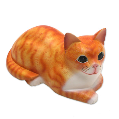 Lying Cat in Orange Signed Wood Sculpture of a Lying Cat in Orange from Bali