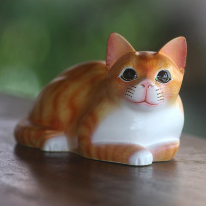 Lying Cat in Orange Signed Wood Sculpture of a Lying Cat in Orange from Bali