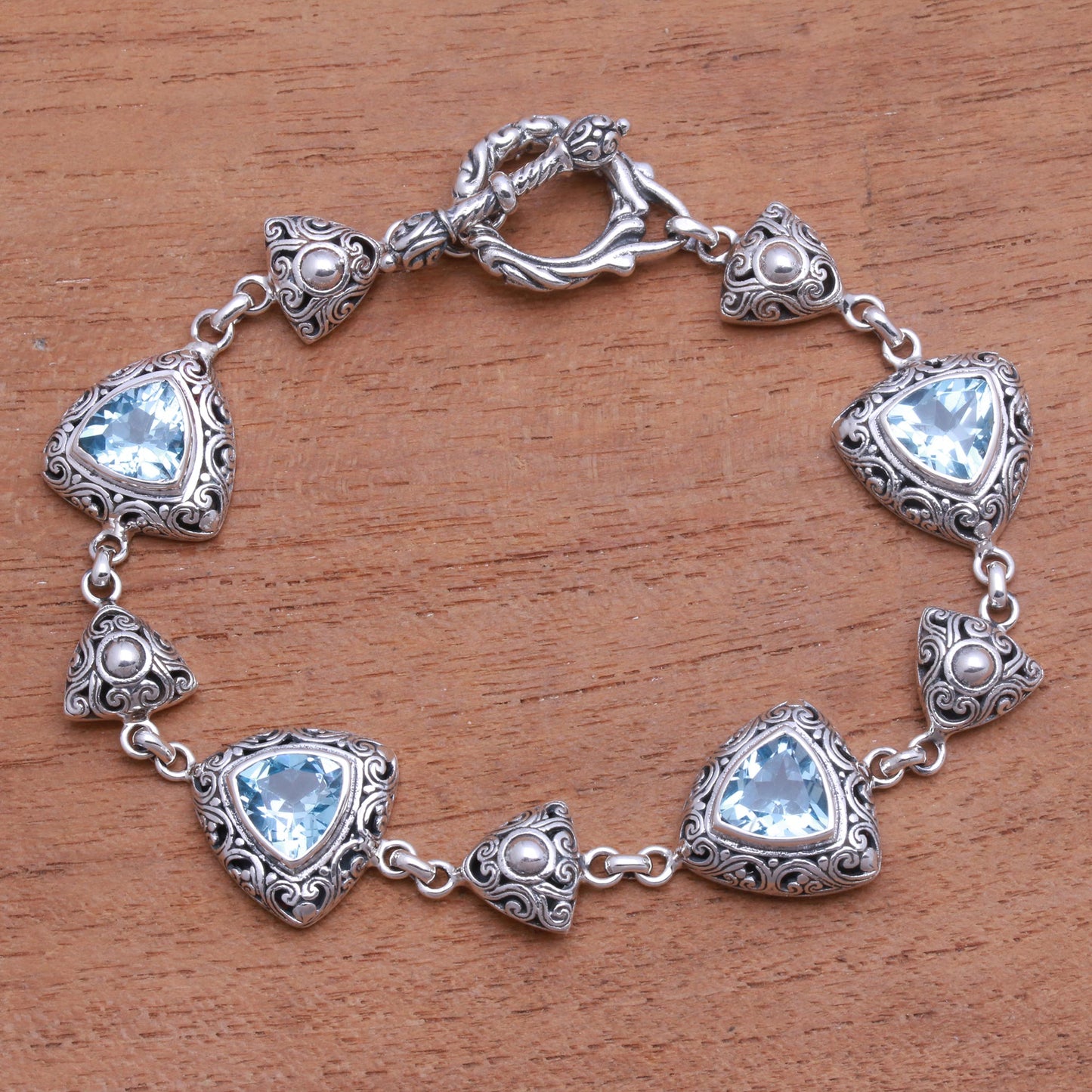 Triangles of Swirls Triangular Blue Topaz Link Bracelet from Bali