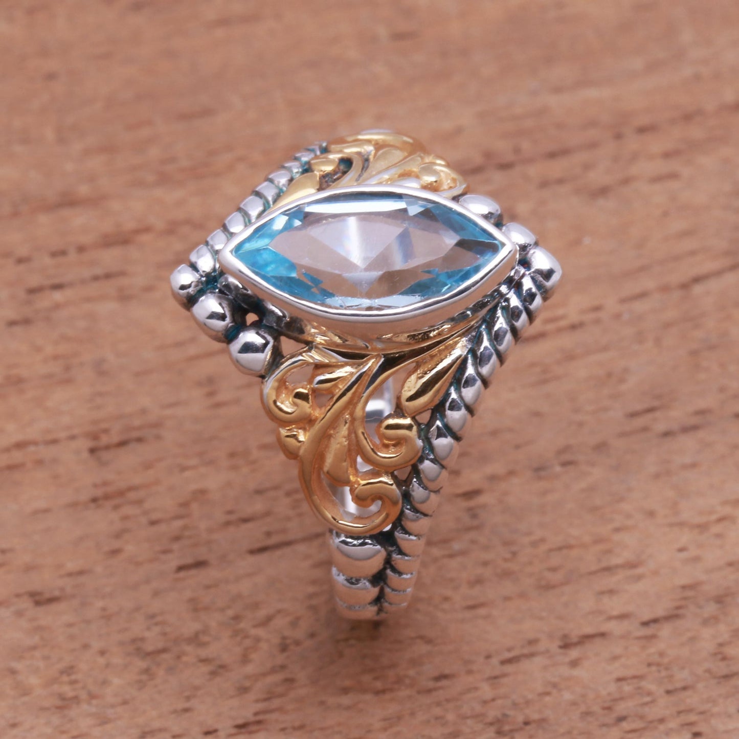 Marquise Order Gold Accented Marquise Blue Topaz Single-Stone Ring