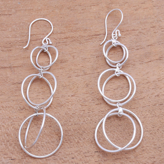 Interlocking Orbits Circular Sterling Silver Dangle Earrings from Bali