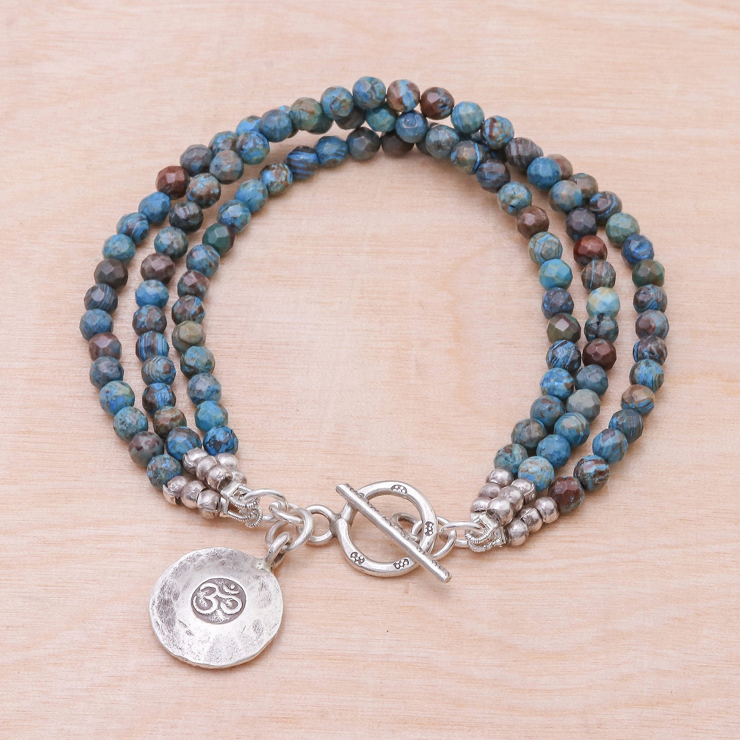 Tiny Globes Om Symbol Beaded Bracelet with Blue and Brown Jasper