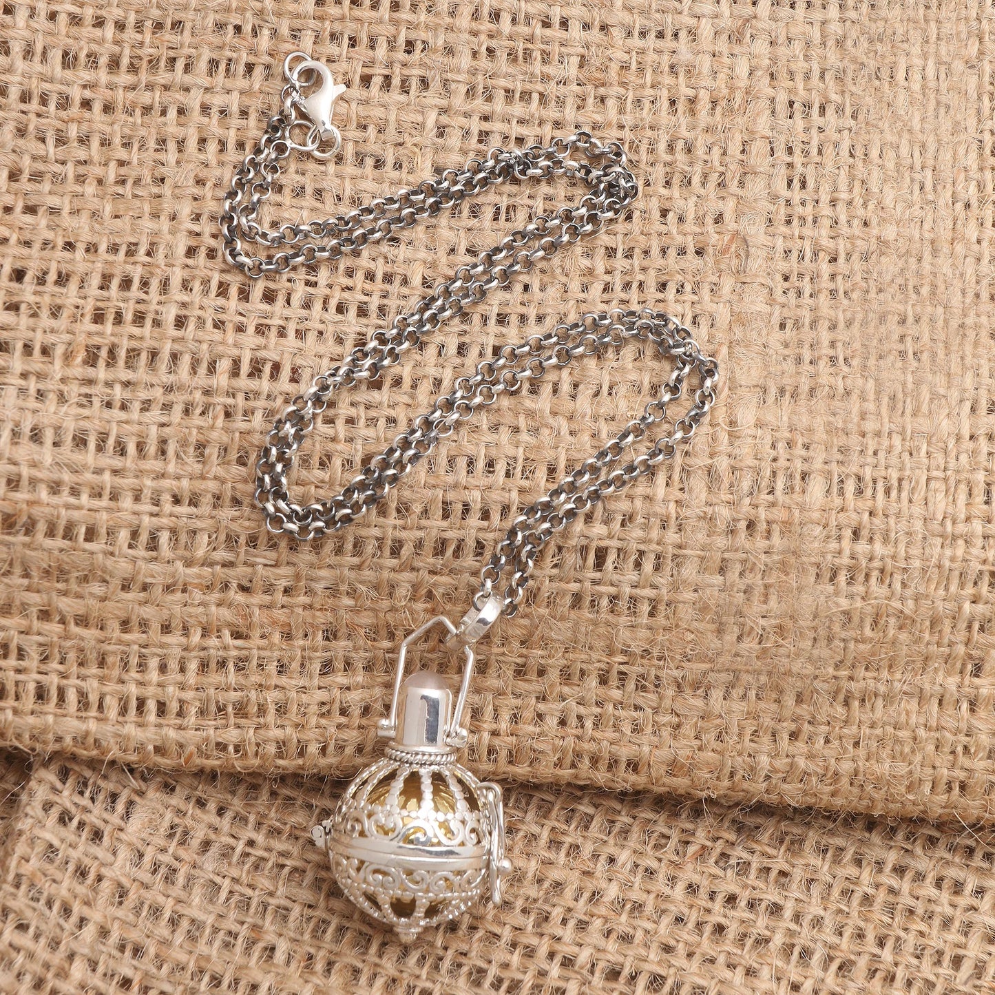 Protective Goddess Silver and Moonstone Harmony Ball Necklace with Brass